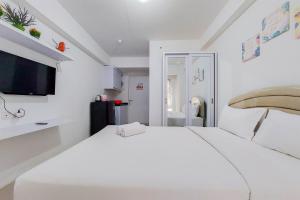 Fancy and Nice Studio at Urbantown Serpong Apartment By Travelio