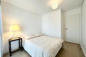 Appartements Spacieux T4 neuf de standing Plein bourg : photos des chambres