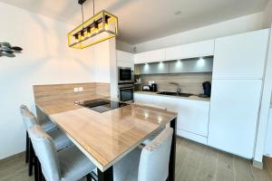 Appartements T3 de standing Plein bourg - 100m des plages : photos des chambres