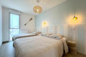 Appartements T3 de standing Plein bourg - 100m des plages : photos des chambres