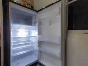 Simple and Homey Studio Room at Paltrow City Apartment By Travelio