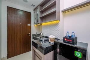 Nice Studio at 7th Floor Transpark Cibubur Apartment By Travelio