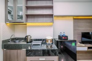 Nice Studio at 7th Floor Transpark Cibubur Apartment By Travelio