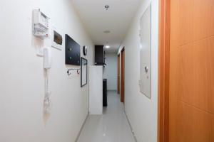 Combined 3BR Apartment without Living Room at Evenciio Margonda By Travelio