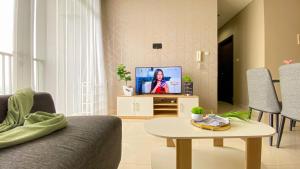 Nice and Wonderful 2BR Ciputra International Apartment By Travelio