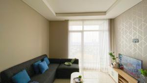 Nice and Wonderful 2BR Ciputra International Apartment By Travelio
