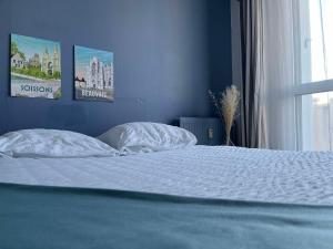 Appartements Duplex urbain spacieux a Compiegne : photos des chambres