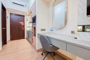 Simply Look and Comfort Studio Room at Casa de Parco Apartment By Travelio