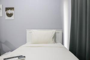 Comfy Studio Apartment at Grand Asia Afrika By Travelio