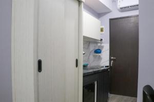 Comfy Studio Apartment at Grand Asia Afrika By Travelio