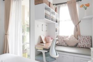 Fancy and Nice Studio at Belmont Residence Puri Apartment By Travelio