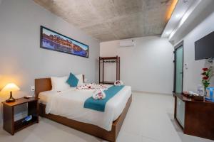Phòng Deluxe Giường Đôi Có Ban Công (Deluxe Double Room with Balcony)