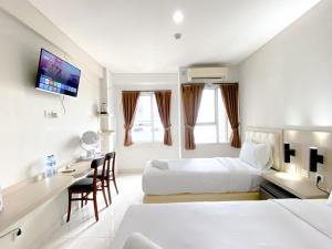 Modern Studio No Kitchen at Elvis Tower Apartment By Travelio