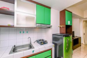 Relaxing Studio Apartment at Margonda Residence 2 near UI By Travelio