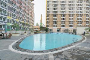 Relaxing Studio Apartment at Margonda Residence 2 near UI By Travelio