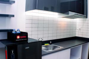 Nice and Homey Studio at Sayana Bekasi Apartment By Travelio