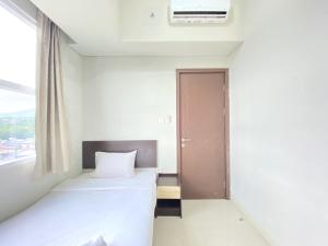 Deluxe and Cozy 2BR Apartment at Skyland City Jatinangor By Travelio