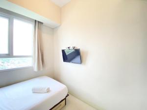 Deluxe and Cozy 2BR Apartment at Skyland City Jatinangor By Travelio
