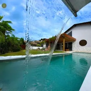 Casa Capri - 4 suítes 20 metros da praia - 卡拉韦拉斯