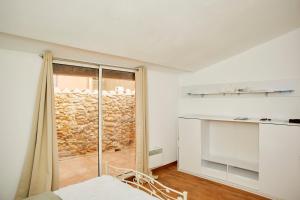 Appartements Maison village T5 : photos des chambres