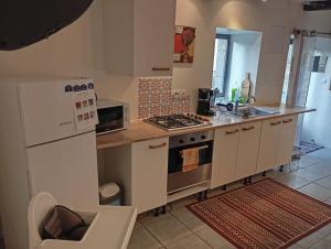 Appartements Maison atypique et charmante : photos des chambres