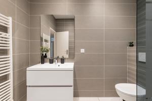Appartements Beige hospitalite - Capucine - Floral charmant chaleureux wifi Netflix : photos des chambres