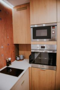 Apartament Dwupoziomowy Butikowy Żmigrodzka, free parking, self check-in