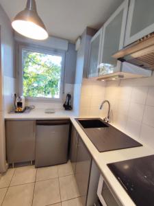 Appartements Roseraie T2 Wifi Parking Clim : photos des chambres