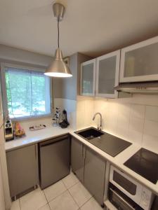 Appartements Roseraie T2 Wifi Parking Clim : photos des chambres