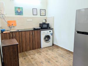 Casa Stay Candolim Holiday Apartments with Pool-Free Parking-WiFi-Powerback up