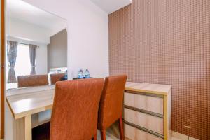 Simply Look Studio Room at Margonda Residence 2 Apartment By Travelio
