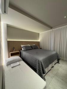 Flat com Jacuzzi Privativa a 50m do mar