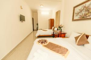 Phòng 4 Người Có Ban Công (Quadruple Room with Balcony)