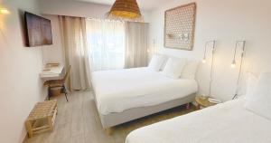 Hotels Blanc Sable Hotel : photos des chambres
