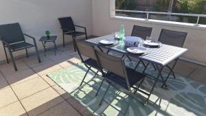 Appartements Paisible appartement central avec terrasse : photos des chambres