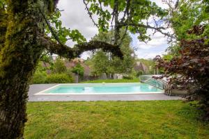 Maisons de vacances Le puits fleuri : photos des chambres