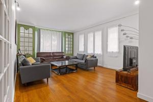 Appartements Les Suites de l-Arc-en-Ciel : photos des chambres