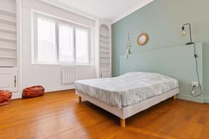 Appartements Les Suites de l-Arc-en-Ciel : photos des chambres