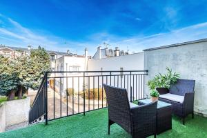Appartements Charmant studio avec terrasse, Gare a 200m et parking gratuit : photos des chambres