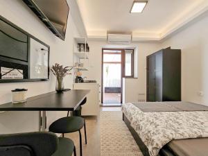 Beschauliches Apartment nur 15 Meter zum Strand, mit heller Terrasse, WiFi