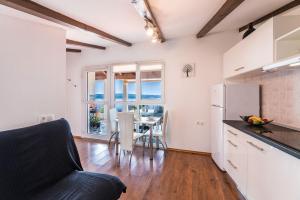 Beeindruckendes Apartment nur 500 Meter zum Strand mit Meerblick, Flat-screen TV auf dem Balkon, BBQ 