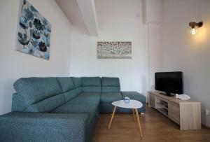 Charmantes Apartment mit privatem Balkon, Privatparkplatz, WiFi und nur 700 Meter zum Strand