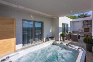 Einzigartige Casita mit Whirlpool, Sauna, Meerblick, Grill, Privatparkplatz