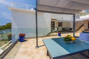 Modernes Apartment direkt am Strand mit Whirlpool, Meerblick, Lounge-Bereich