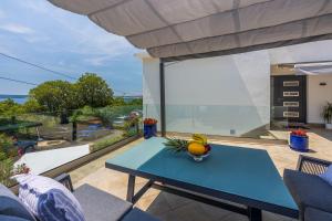 Modernes Apartment direkt am Strand mit Whirlpool, Meerblick, Lounge-Bereich