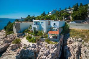 Traumhaftes Apartment direkt am eigenen Strand mit privatem Balkon, Meerblick, Klima, WiFi