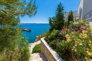 Traumhaftes Apartment direkt am eigenen Strand mit privatem Balkon, Meerblick, Klima, WiFi