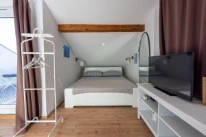 Atemberaubendes Studio direkt am Meer mit privatem Balkon, Grill, Meerblick