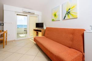 Cozy Dachgeschosswohnung mit Meerblick, Klima, WiFi - nur 350 Meter zum Strand