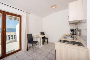 Idyllisches Studio-Apartment mit grandiosen Meerblick, Privatparkplatz, WiFi